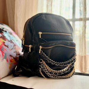 Ash Black Leather Backpack with Gold Chain Accents